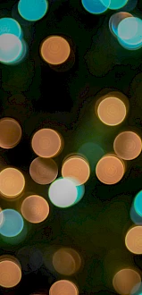 The image shows colorful bokeh lights, likely from a cluster of blurred lights.